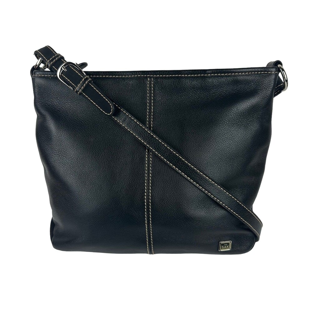 The Sak Pebbled Black Leather Shoulder Bag Adjustable Strap Floral Lining